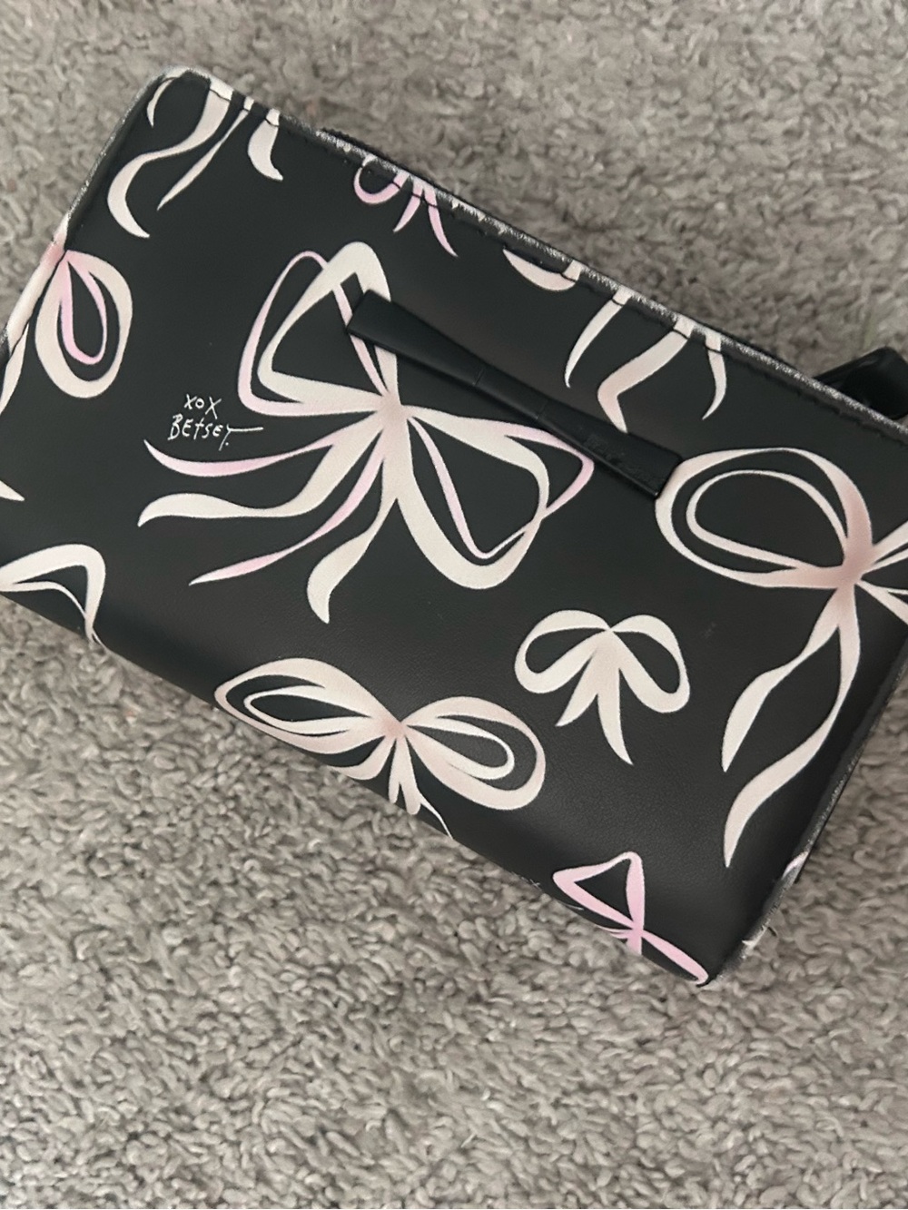 Pink white and black wallet